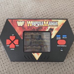 1989 WWF WrestleMania Challenge Handheld Electronic Video Game Akklaim WORKS WWE